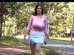 Brunette with huge tits flash on public