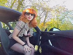 British mature Red fingers her cunt in the car again